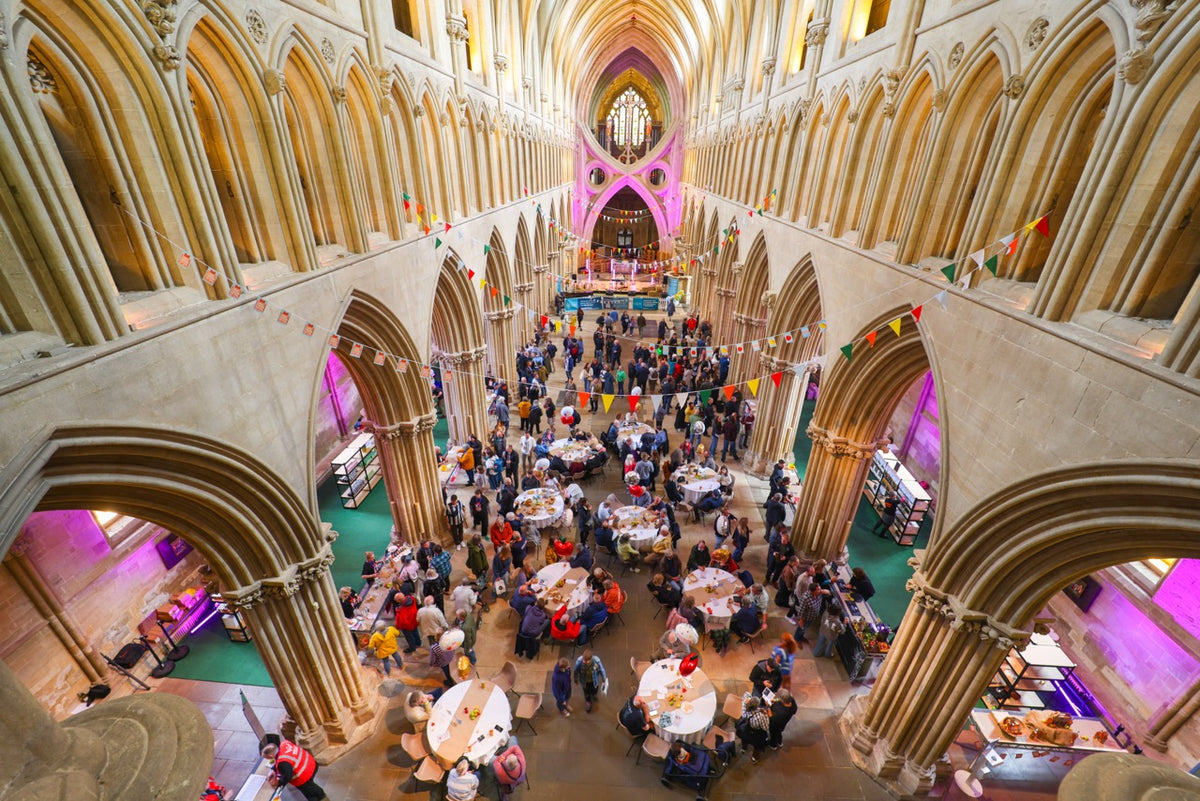 The Cider & Cheese Festival filling the nave of Wells Cathedral, seen from above